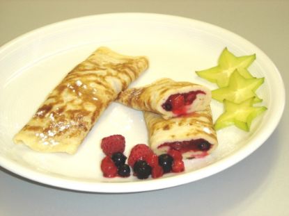 Bild von Pfannkuchen mit der Beschreibung mit Rote-Grütze-Füllung